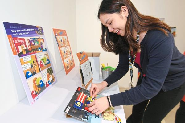 A visitor trying out an interactive exhibit at the KL Literature and Art Fair 2024. Photo: The Star/Ong Soon Hin 