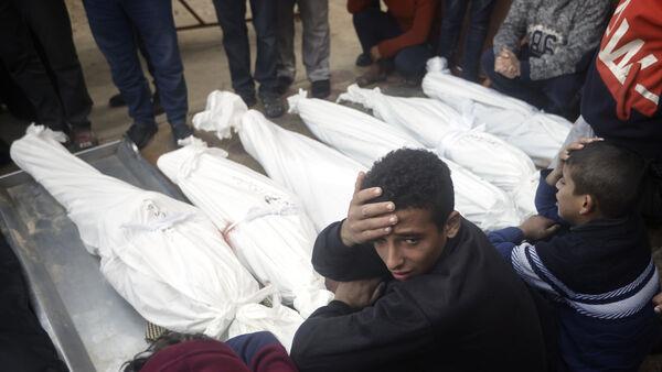 Airstrike kills 12, mostly children, in Gaza area declared safe zone by Israel